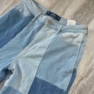 High rise mom jean from Hollister, blue patchwork, slightly worn great condition
